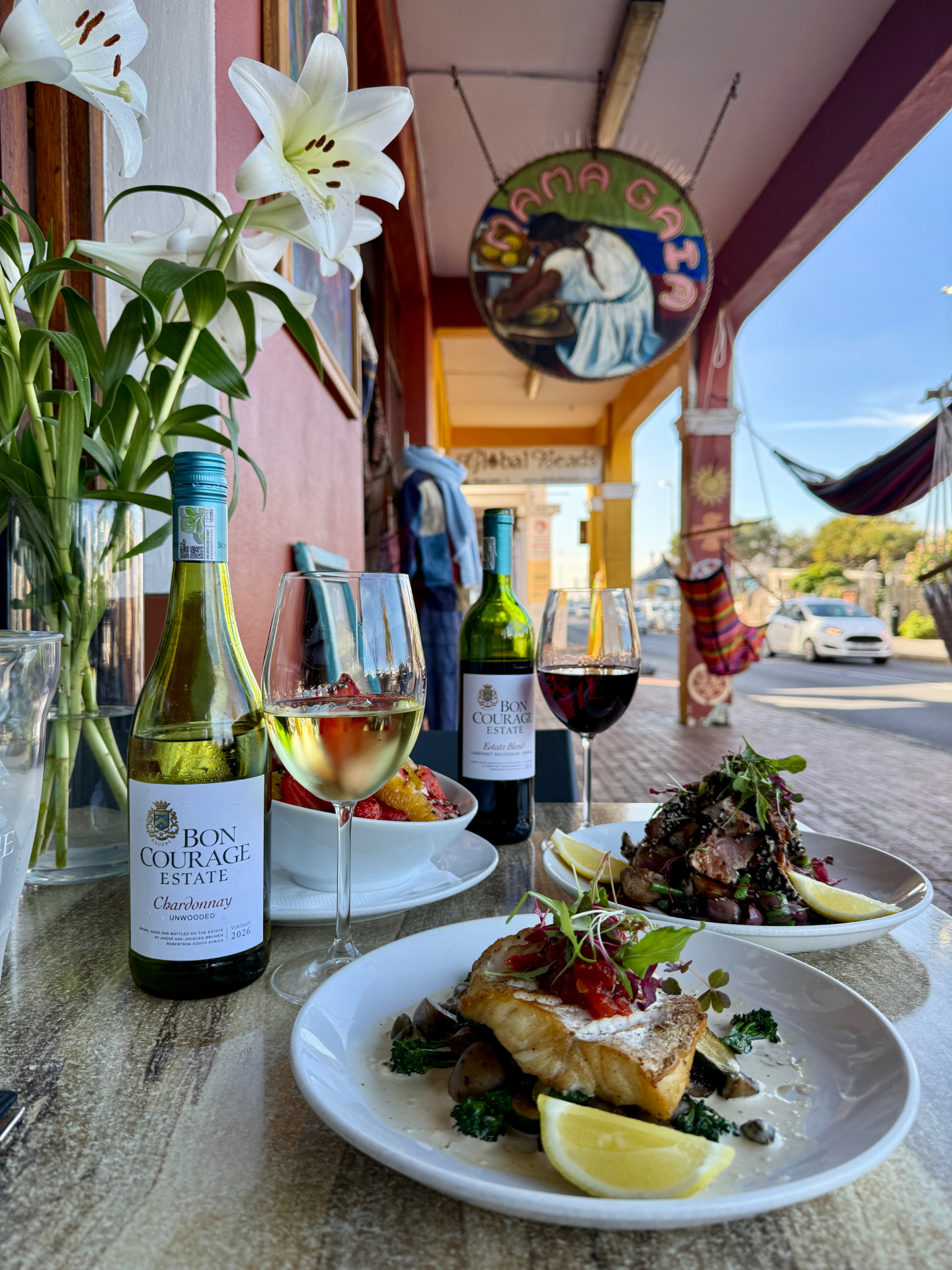Satori Kalk Bay table setting with wine and seafood