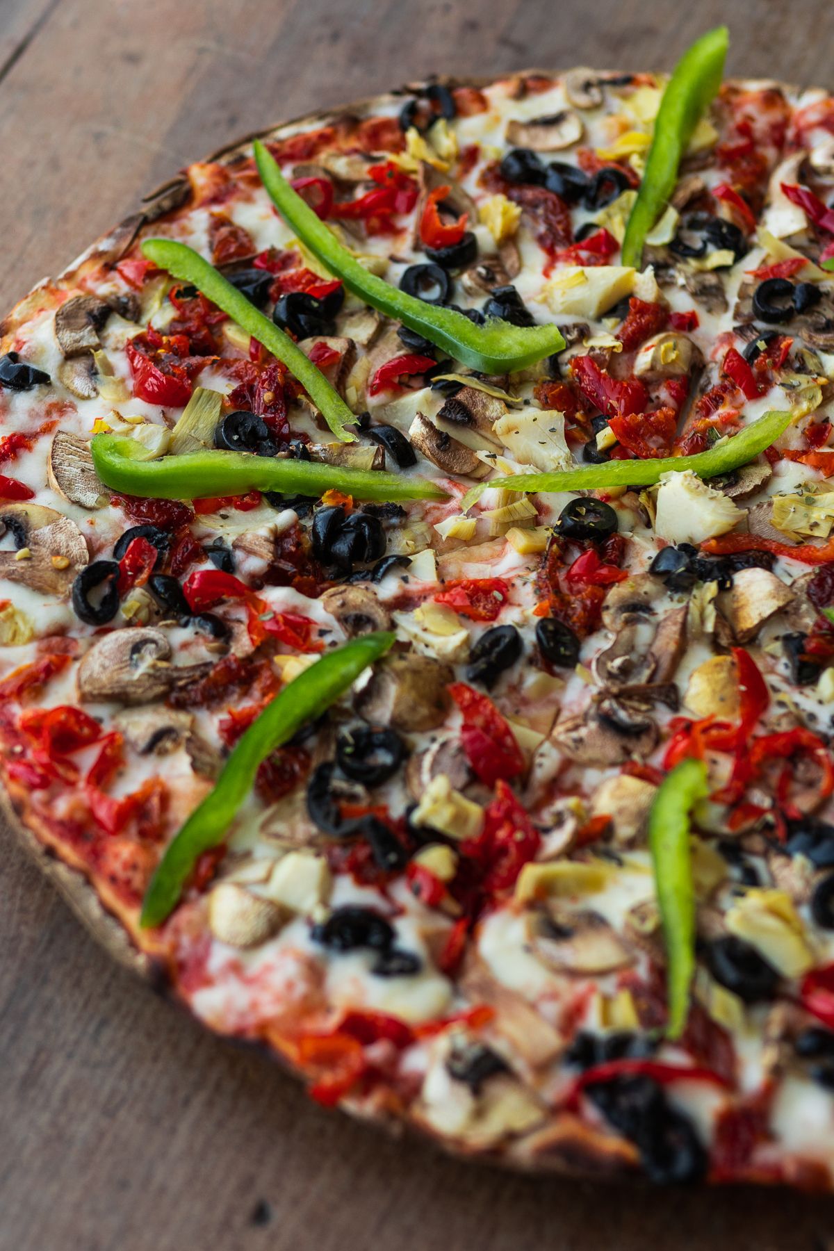 Freshly prepared pizza at Satori Kalk Bay